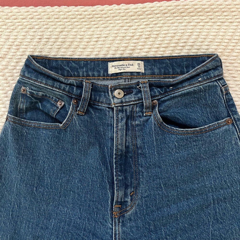 Abercrombie and Fitch dark wash, wide legged jeans.
